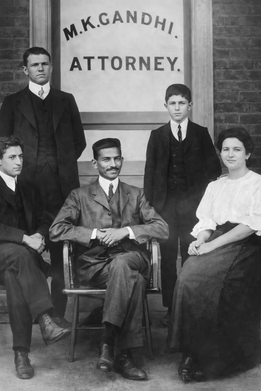 mahatma gandhi with his law firm partner pollock in johanessburg